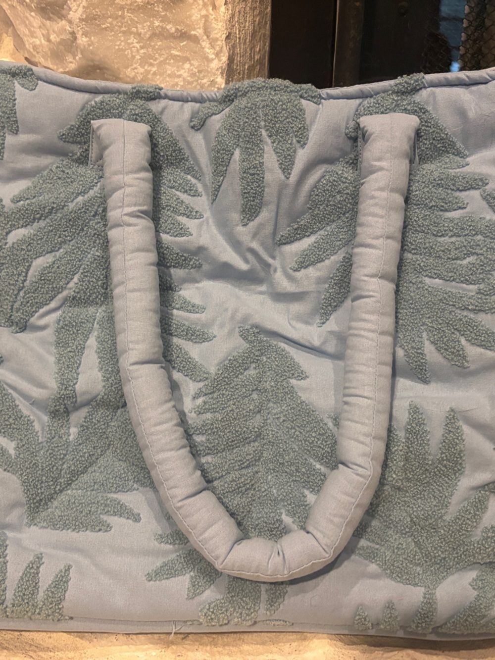 Shade & Shore Light Blue Tropical Leaf Quilted Bath Mat with Handles